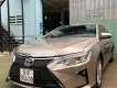 Toyota Camry 2015 - Xe Toyota Camry 2.5Q năm sản xuất 2015, màu vàng đồng, xe gia đình sử dụng giữ gìn cẩn thận còn rất mới