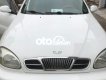 Daewoo Lanos 2002 - Cần bán gấp Daewoo Lanos sản xuất năm 2002, màu trắng, xe nhập