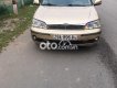 Ford Laser    MT 2002 - Bán Ford Laser MT năm 2002, màu vàng