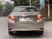 Toyota Vios    E  2014 - Cần bán Toyota Vios E sản xuất 2014, màu vàng