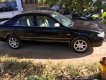 Mazda 626 MT 2002 - Cần bán xe Mazda 626 MT sản xuất năm 2002, màu đen