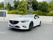 Mazda 6 2014 - Cần bán gấp Mazda 6 2.0AT, năm sản xuất 2014, màu trắng, chủ dùng rất cẩn thận, giữ gìn, xe nguyên bản 100%