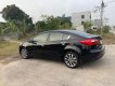 Kia K3 2014 - Cần bán gấp Kia K3 1.6AT sản xuất năm 2014, màu đen giá cạnh tranh