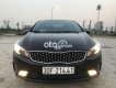 Kia Cerato   AT 2018 - Cần bán gấp Kia Cerato AT năm 2018, màu đen
