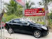 Chevrolet Aveo   LT 2014 - Cần bán Chevrolet Aveo LT sản xuất 2014, màu đen, nhập khẩu