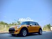 Mini Cooper  1.5 Turbo  2014 - Cần bán xe Mini Cooper 1.5 Turbo năm 2014, màu vàng, nhập khẩu nguyên chiếc