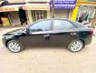 Kia Cerato AT 2009 - Bán ô tô Kia Cerato AT sản xuất năm 2009, màu đen, giá tốt