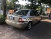 Ford Laser MT 2002 - Cần bán xe Ford Laser MT năm 2002, màu nâu