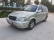 Kia Carnival GS 2009 - Cần bán lại xe Kia Carnival GS sản xuất năm 2009, màu bạc