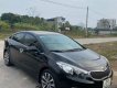 Kia K3 2014 - Cần bán Kia K3 1.6AT năm sản xuất 2014, màu đen, 400 triệu, xe siêu chất cho anh em đi tết