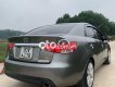 Kia Forte 2009 - Bán ô tô Kia Forte SLI 1.6AT sản xuất năm 2009, màu xám, nhập khẩu nguyên chiếc