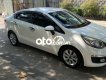 Kia Rio MT 2017 - Cần bán lại xe Kia Rio MT năm sản xuất 2017, màu trắng xe gia đình