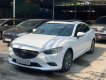 Mazda 6 2016 - Cần bán gấp Mazda 6 sản xuất 2016, màu trắng, cam kết xe không đại tu động cơ hộp số, bao check hãng thaoir mái