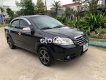 Daewoo Gentra 2009 - Cần bán gấp Daewoo Gentra SX sản xuất 2009, màu đen, nhập khẩu