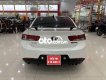 Kia Forte Koup 1.6AT  2009 - Cần bán gấp Kia Forte Koup 1.6AT sản xuất năm 2009, màu trắng, nhập khẩu nguyên chiếc, giá 345tr