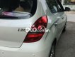 Hyundai i20 2010 - Xe Hyundai i20 1.4AT đời 2010, màu trắng xe gia đình