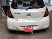 Hyundai i20 2010 - Xe Hyundai i20 1.4AT đời 2010, màu trắng xe gia đình