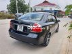 Daewoo Gentra SX 2010 - Bán Daewoo Gentra SX sản xuất 2010, màu đen