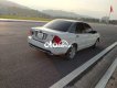 Ford Laser 1.8MT 2002 - Cần bán xe Ford Laser 1.8MT năm 2002, màu trắng, giá 130tr