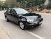 Ford Laser  1.6AT 2004 - Cần bán Ford Laser 1.6AT năm 2004, màu đen, 160 triệu