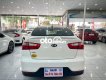 Kia Rio 2016 - Cần bán xe Kia Rio 1.4 AT Sedan sản xuất năm 2016, màu trắng, xe nhập