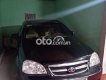 Daewoo Lacetti  EX 2010 - Cần bán gấp Daewoo Lacetti EX năm 2010, màu đen xe gia đình