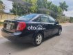 Daewoo Lacetti EX 2009 - Cần bán Daewoo Lacetti EX năm 2009, màu đen xe gia đình