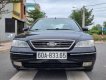 Ford Mondeo V6 2004 - Cần bán lại xe Ford Mondeo V6 sản xuất 2004, màu đen số tự động