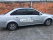 Daewoo Lacetti EX 1.6MT 2005 - Xe Daewoo Lacetti EX 1.6MT năm sản xuất 2005, màu bạc, 124tr