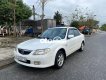 Mazda 323 2.0MT 2003 - Bán Mazda 323 2.0MT năm sản xuất 2003, màu trắng, nhập khẩu nguyên chiếc, giá 119tr