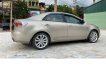 Kia Forte 2010 - Cần bán xe Kia Forte SX 1.6 AT năm sản xuất 2010, màu vàng