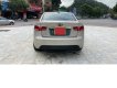 Kia Forte 2010 - Cần bán xe Kia Forte SX 1.6 AT năm sản xuất 2010, màu vàng