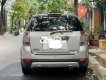 Chevrolet Captiva   LT 2010 - Cần bán lại xe Chevrolet Captiva LT sản xuất 2010, màu bạc còn mới