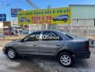 Mazda 323  GLX 1998 - Cần bán gấp Mazda 323 GLX năm sản xuất 1998, màu xám, giá chỉ 60 triệu