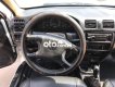 Mazda 323 MT 2000 - Bán Mazda 323 MT sản xuất 2000, màu trắng