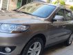 Hyundai Santa Fe MLX 2009 - Cần bán lại xe Hyundai Santa Fe MLX năm sản xuất 2009, màu nâu