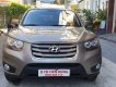 Hyundai Santa Fe MLX 2009 - Cần bán lại xe Hyundai Santa Fe MLX năm sản xuất 2009, màu nâu