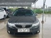 Kia Forte 1.6AT 2009 - Cần bán Kia Forte 1.6AT sản xuất 2009, màu đen, nhập khẩu xe gia đình, giá tốt