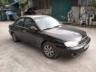 Kia Spectra   2003 - Bán Kia Spectra năm 2003, màu đen, nhập khẩu nguyên chiếc giá cạnh tranh