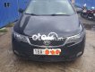 Kia Forte 2012 - Cần bán xe Kia Forte SX 1.6 AT sản xuất 2012, màu đen, nhập khẩu