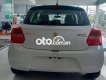Suzuki Swift 2021 - Cần bán Suzuki Swift 1.4AT sản xuất 2021, màu trắng, xe nhập