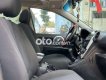 Kia Carens   2.0EX   2010 - Bán xe Kia Carens 2.0EX sản xuất năm 2010, màu đen còn mới