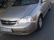 Chevrolet Lacetti 2011 - Cần bán lại xe Chevrolet Lacetti EX 1.6MT 2011, màu vàng