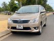 Toyota Innova E  2013 - Bán ô tô Toyota Innova E sản xuất 2013, màu vàng số sàn