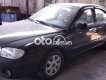 Kia Spectra 2005 - Bán xe Kia Spectra sản xuất 2005, màu đen, nhập khẩu nguyên chiếc