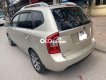 Kia Carens 2011 - Cần bán xe Kia Carens 2.0MT năm 2011, màu vàng cát