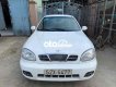 Daewoo Lanos 2004 - Cần bán Daewoo Lanos MT sản xuất năm 2004, màu trắng