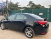 Toyota Corolla 2015 - Cần bán gấp Toyota Corolla 1.8G năm sản xuất 2015, màu đen, giá chỉ 543 triệu