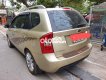 Kia Carens 2012 - Bán ô tô Kia Carens sản xuất 2012, màu vàng