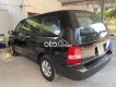 Kia Carnival 2009 - Cần bán lại xe Kia Carnival năm sản xuất 2009, màu đen